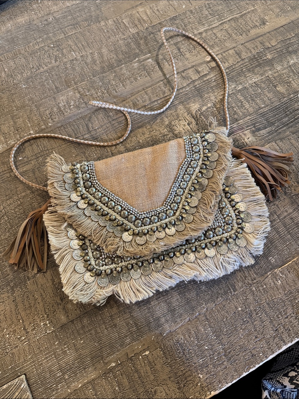 SHASHI Beige Fringe Crossbody with Coin & Bead Embellishment
